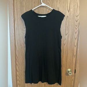 Black dress with shoulder pads